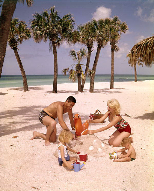 photo of a family building a sand castle